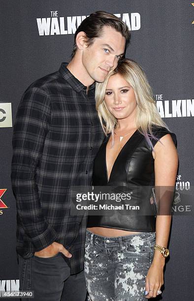 Ashley Tisdale and her husband, musician Christopher French arrive at AMC's "The Walking Dead" Season 5 Premiere held at AMC Universal City Walk on...