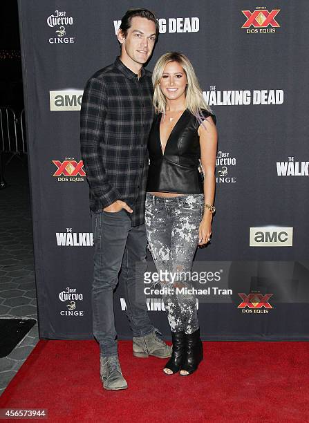 Ashley Tisdale and her husband, musician Christopher French arrive at AMC's "The Walking Dead" Season 5 Premiere held at AMC Universal City Walk on...