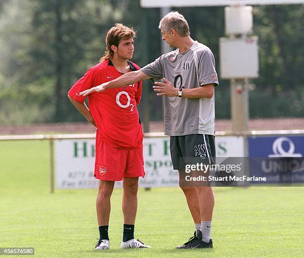 Cesc Fabregas talks to Arsenal manager Arsene Wenger during Arsenal Pre Season Training on July 24, 2004 in Bad Waltersdorf, Austria.