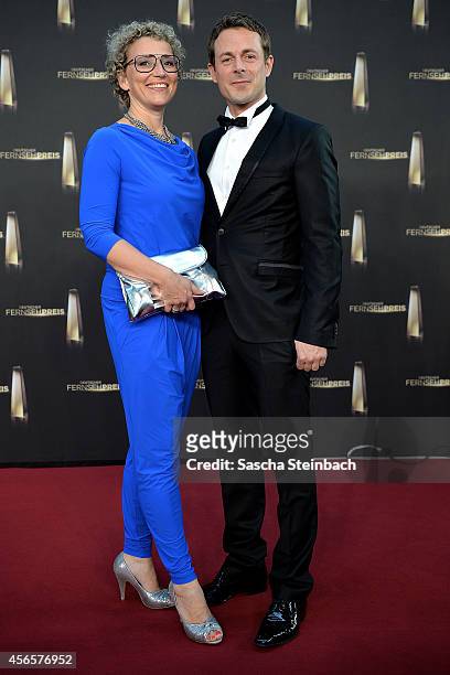 Julia Westlake and Alexander Bommes arrive at the "Deutscher Fernsehpreis 2014" at Coloneum on October 2, 2014 in Cologne, Germany.