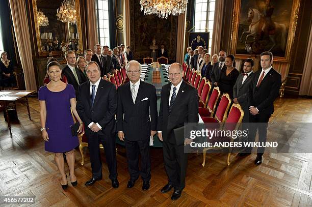 Sweden´s new government poses together with front from left, Crown Princess Victoria, Prime Minister Stefan Loefven, King Carl Gustaf and Urban Ahlin...