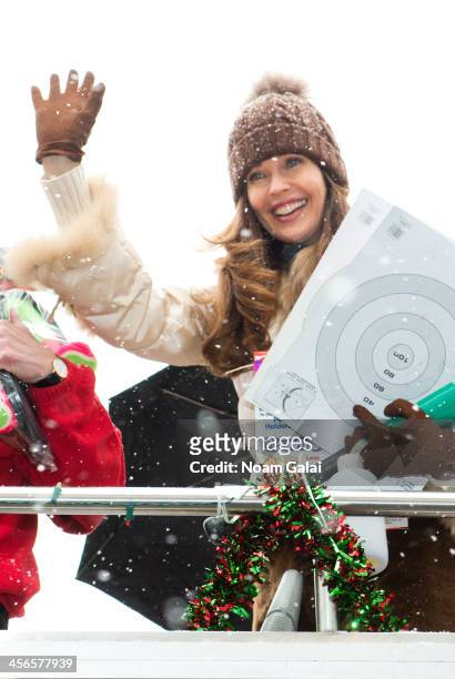 Model Carol Alt attends the 2013 CitySightseeing New York holiday toy drive at PAL's Harlem Center on December 14, 2013 in New York City.