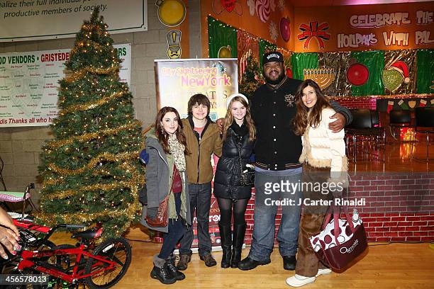 Juliette Goglia, Brenden Meyer, Kerris Dorsey, Grizz Chapman, and Carol Alt attend CitySightseeing New York 2013 holiday toy drive at PAL's Harlem...