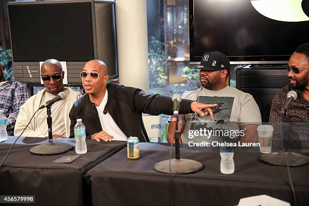 Rappers Inspectah Deck, U-God, Raekwon and RZA of the Wu-Tang Clan attend a press conference to announce that the Wu-Tang Clan has signed with Warner...