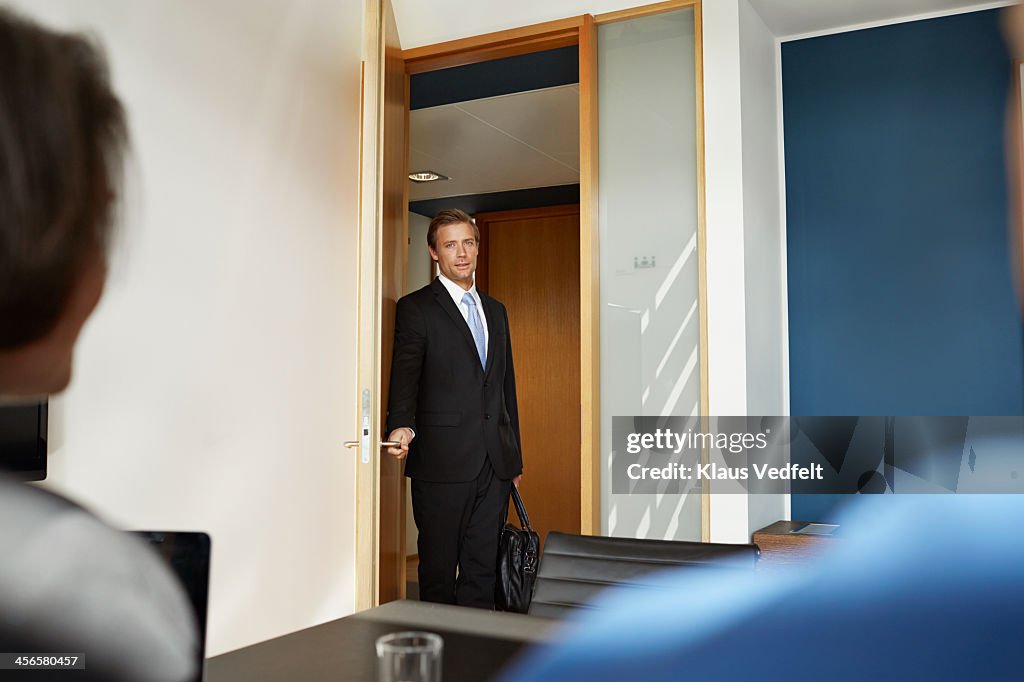 Busisenessman walking in to job interview
