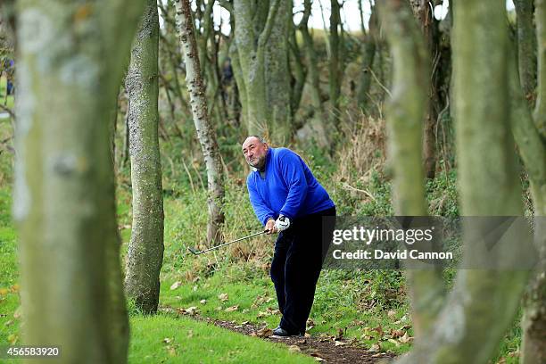 Andrews Chandler of England and ISM plays his second shot on the par 3, 15th hole during the second round of the 2014 Alfred Dunhill Links...