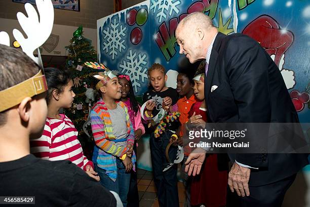 Police Commissioner Ray Kelly attends the 2013 CitySightseeing New York holiday toy drive at PAL's Harlem Center on December 14, 2013 in New York...