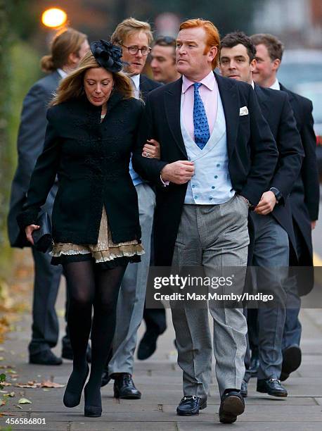 Amanda Dyer and Mark Dyer attend the wedding of Jake Warren and Zoe Stewart in the Wren Chapel at the Royal Hospital Chelsea on December 14, 2013 in...