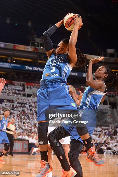 Tan White of the Minnesota Lynx grabs a rebound against the Phoenix Mercury in Game 1 of the 2014 WNBA Western Conference Finals on August 29, 2014...