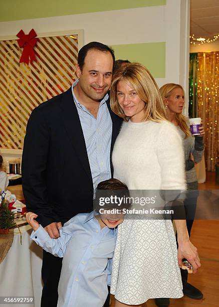 Elizabeth Guber and family attend the Third Annual Baby2Baby Holiday Party presented by The Honest Company on December 14, 2013 in Los Angeles,...