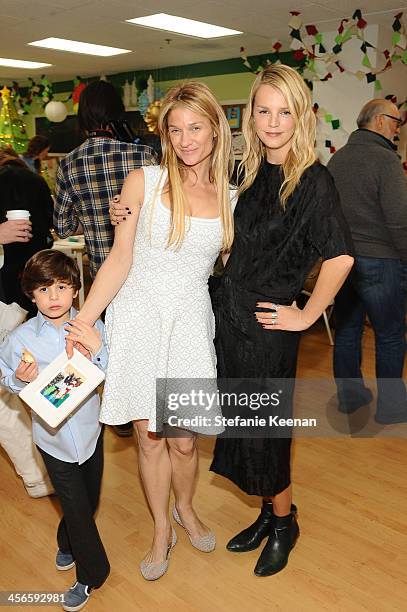 Elizabeth Guber and Kelly Sawyer attend the Third Annual Baby2Baby Holiday Party presented by The Honest Company on December 14, 2013 in Los Angeles,...