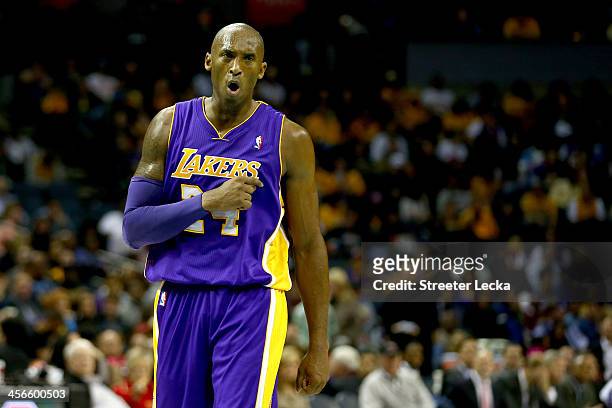 Kobe Bryant of the Los Angeles Lakers reacts after a call during their game against the Charlotte Bobcats at Time Warner Cable Arena on December 14,...