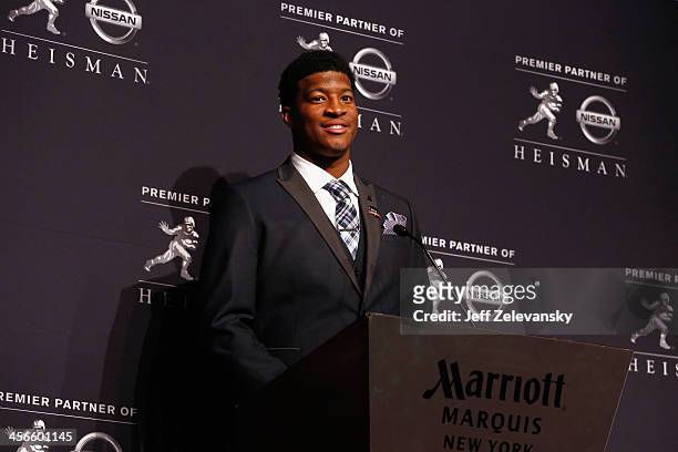 Jameis Winston, quarterback of the Florida State Seminoles, speaks to the media during a press conference after the 2013 Heisman Trophy Presentation...