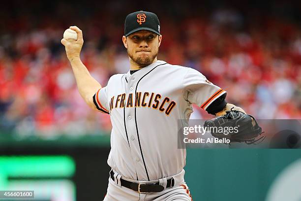 Jake Peavy of the San Francisco Giants pitches in the first inning against the Washington Nationals during Game One of the National League Division...