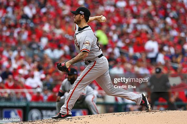 Jake Peavy of the San Francisco Giants pitches in the first inning against the Washington Nationals during Game One of the National League Division...