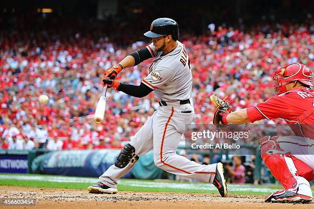 Gregor Blanco of the San Francisco Giants lines out to center in the third inning against the Washington Nationals during Game One of the National...