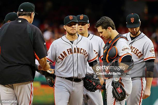 Jake Peavy of the San Francisco Giants is removed from the game in the sixth inning during Game One of the National League Division Series against...