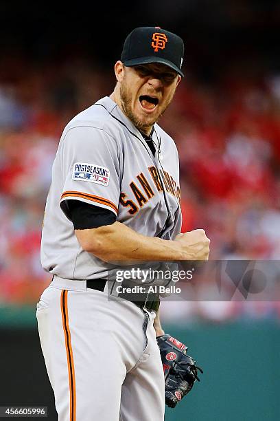 Jake Peavy of the San Francisco Giants reacts after walking Jayson Werth of the Washington Nationals in the sixth inning during Game One of the...