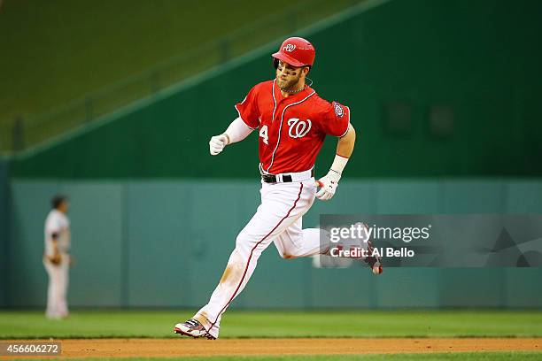 Bryce Harper of the Washington Nationals rounds the bases after hitting a home run in the seventh inning against the San Francisco Giants during Game...