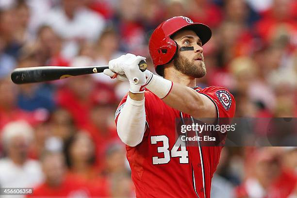 Bryce Harper of the Washington Nationals hits a home run in the seventh inning against the San Francisco Giants during Game One of the National...