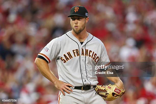 Hunter Strickland of the San Francisco Giants reacts after giving up a home run to Asdrubal Cabrera of the Washington Nationals in the seventh inning...