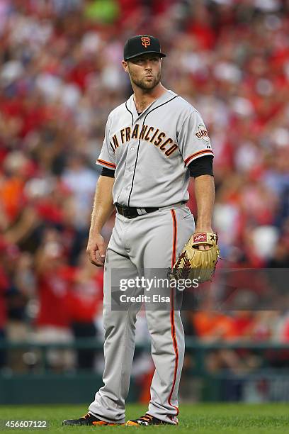 Hunter Strickland of the San Francisco Giants reacts after giving up a home run to Bryce Harper of the Washington Nationals in the seventh inning...