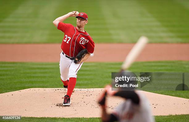 Stephen Strasburg of the Washington Nationals pitches in the first inning against the San Francisco Giants during Game One of the National League...