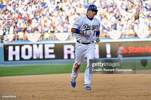 Ellis of the Los Angeles Dodgers runds the bases after his two-run homerun in the fifth inning during Game One of the National League Division Series...