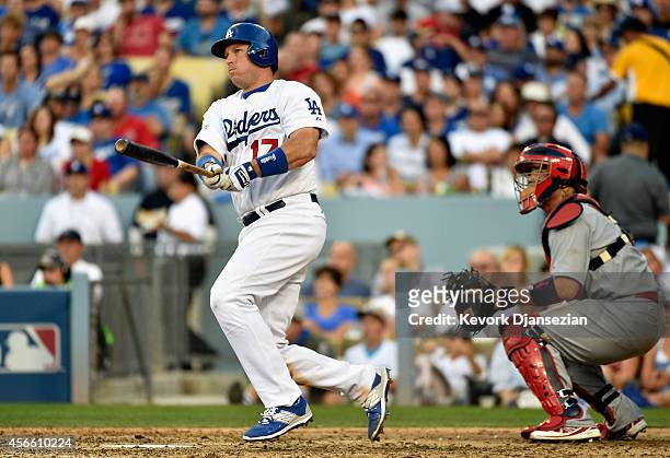Ellis of the Los Angeles Dodgers hits a two-run homerun in the fifth inning during Game One of the National League Division Series against the St....