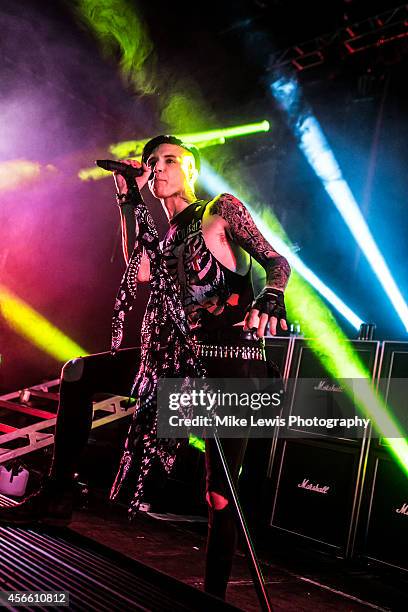 Andy Biersack of Black Veil Brides performs on stage at Cardiff University on October 3, 2014 in Cardiff, United Kingdom.