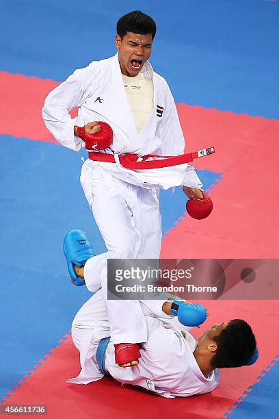 Theerapat Kangtong of Thailand competes in the Men's -84kg Quarter Final match against Phung Nguyen Minh of Vietnam during day fifteen of the 2014...