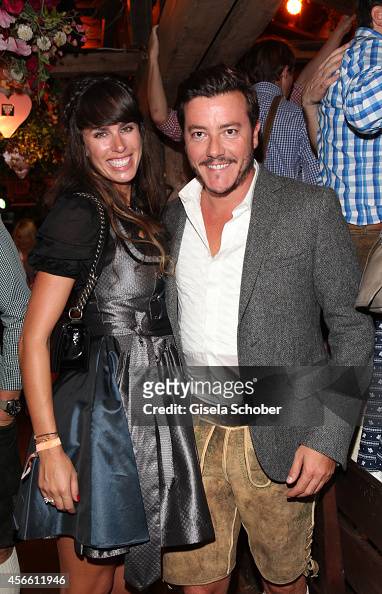 Rene Benko and his wife Nathalie Benko during Oktoberfest at... News ...
