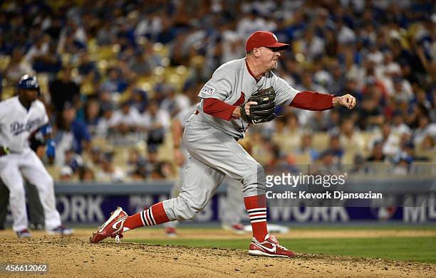 Randy Choate of the St. Louis Cardinals pitches against the Los Angeles Dodgers in the eighth inning of Game One of the National League Division...