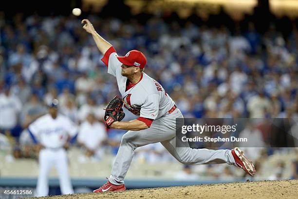 Closing pitcher Trevor Rosenthal of the St. Louis Cardinals pitches against the Los Angeles Dodgers in the ninth inning of Game One of the National...