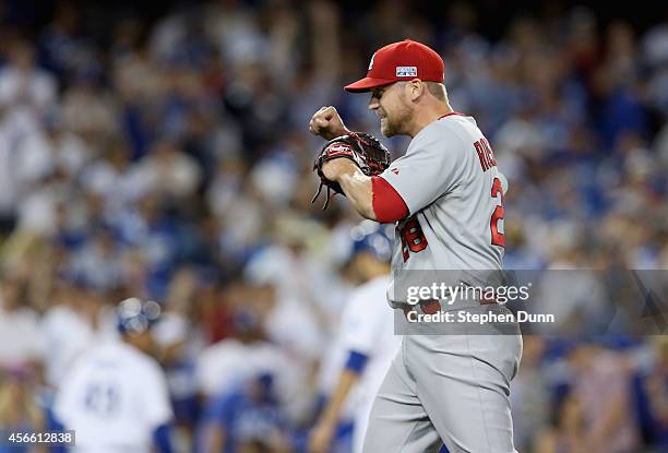 Closing pitcher Trevor Rosenthal of the St. Louis Cardinals celebrates after the last out in the ninth inning of Game One of the National League...