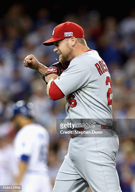 Closing pitcher Trevor Rosenthal of the St. Louis Cardinals celebrates after the last out of Game One of the National League Division Series against...