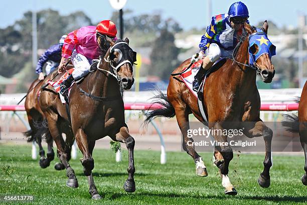 Glenn Boss riding Magicool winning Race 2,the UCI Stakes during Turnbull Stakes Day at Flemington Racecourse on October 4, 2014 in Melbourne,...