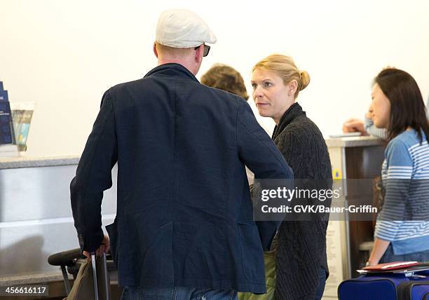 Claire Danes and "Homeland" co-star, Damian Lewis are seen at Los Angeles International Airport on July 30, 2013 in Los Angeles, California.