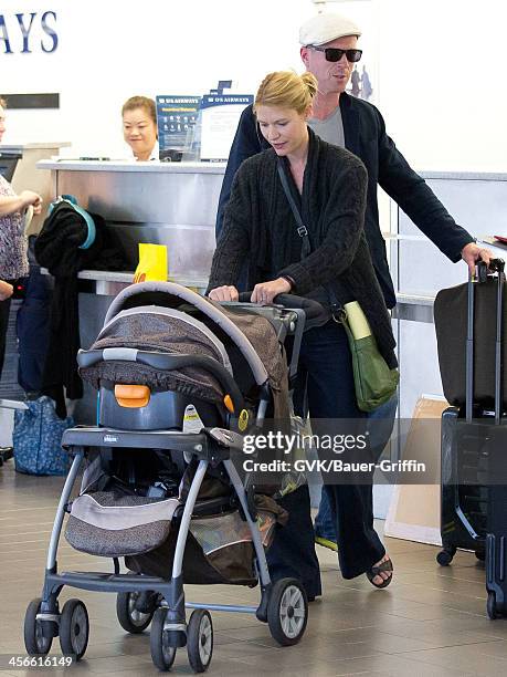 Claire Danes is seen at Los Angeles International Airport with her son Cyrus Dancy and "Homeland" co-star, Damian Lewis on July 30, 2013 in Los...