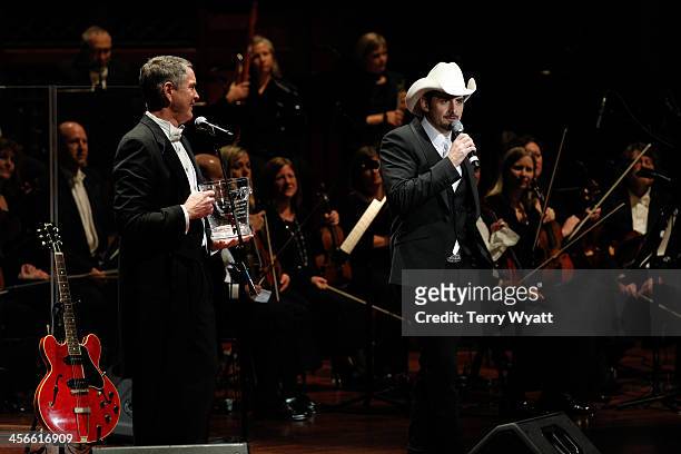 Brad Paisley receives the Harmony award from Senator Bill Frist at the 29th annual Symphony Ball at Schermerhorn Symphony Center on December 14, 2013...