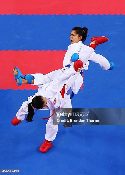 Tippawan Khamsi of Thailand competes against Yee Ting Tsang of Hong Kong in the Women's -50kg Quater Final during day fifteen of the 2014 Asian Games...