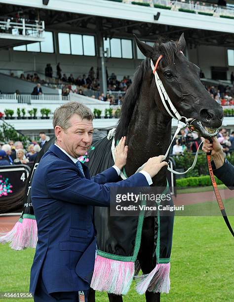 Trainer Kris Lees poses with Lucia Valentina after winning Race 7, the Turnball Stakes during Turnbull Stakes Day at Flemington Racecourse on October...