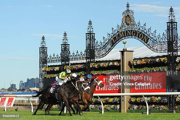 Kerrin McEvoy riding Lucia Valentina defeats Steven Arnold riding Lidari and Luke Nolen riding Brambles in Race 7, the Turnball Stakes during...