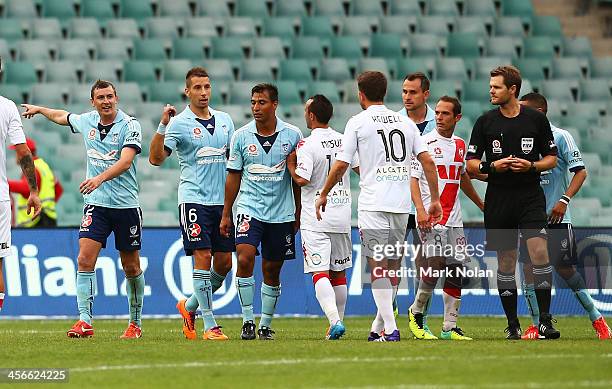 Sydney FC players taunt Harry Kewell after he missed a penalty shot at goal during the round 10 A-League match between Sydney FC and the Melbourne...