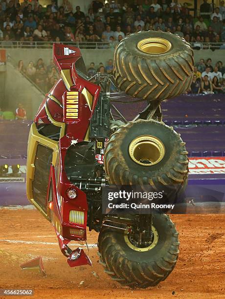 Lee O'Donnell driving Iron Man crashes during Monster Jam at AAMI Park on October 4, 2014 in Melbourne, Australia.