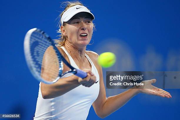 Maria Sharapova of Russia plays a forehand in her match against Ana Ivanovic of Serbia during day eight of the China Open at the China National...