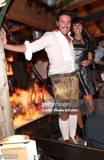 Rene Benko and his wife Nathalie Benko during Oktoberfest at Kaeferzelt/Theresienwiese on October 3, 2014 in Munich, Germany.