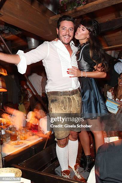 Rene Benko and his wife Nathalie Benko during Oktoberfest at Kaeferzelt/Theresienwiese on October 3, 2014 in Munich, Germany.