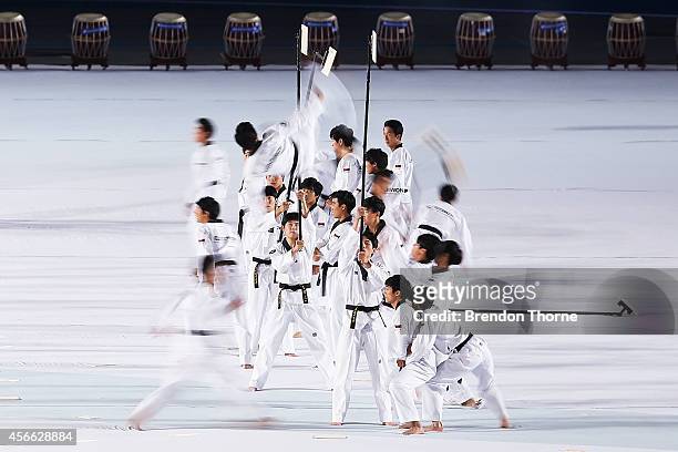 Entertainers perform on stage as part of the Closing Ceremony during day fifteen of the 2014 Asian Games at Incheon Asiad Main Stadium on October 4,...