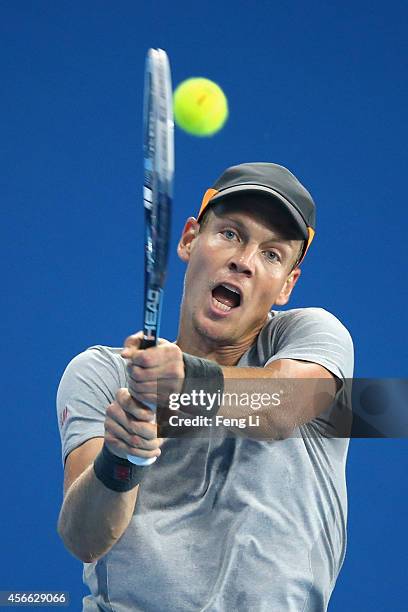 Tomas Berdych of the Czech Republic returns a shot during his semifinal match against Martin Klizan of Slovakia on day eight of the China Open at the...